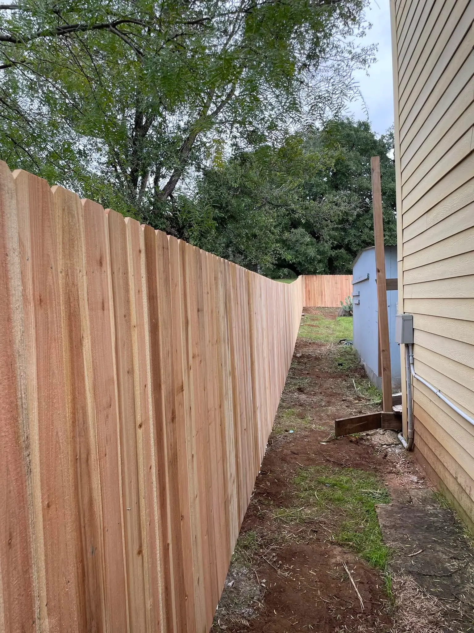 Cedar wood fencing and property maintenance by VP Welding in Burnet TX